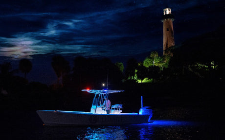 Sunny Isles Beach boat at night, illuminated by LED lights