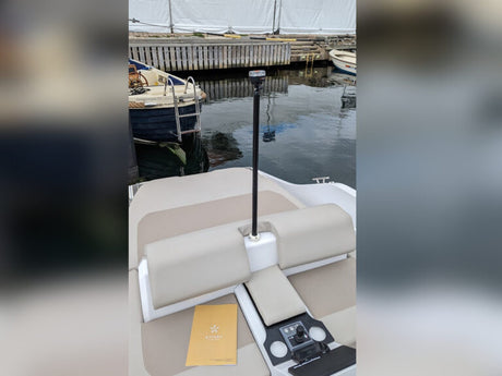 Complete Navisafe Inflatable Skiff & Dinghy Kit displayed with lights, pole, mounts on small boat

