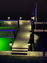 12V black piling cap light with dynamic RGBW LED output lit cool white at night
