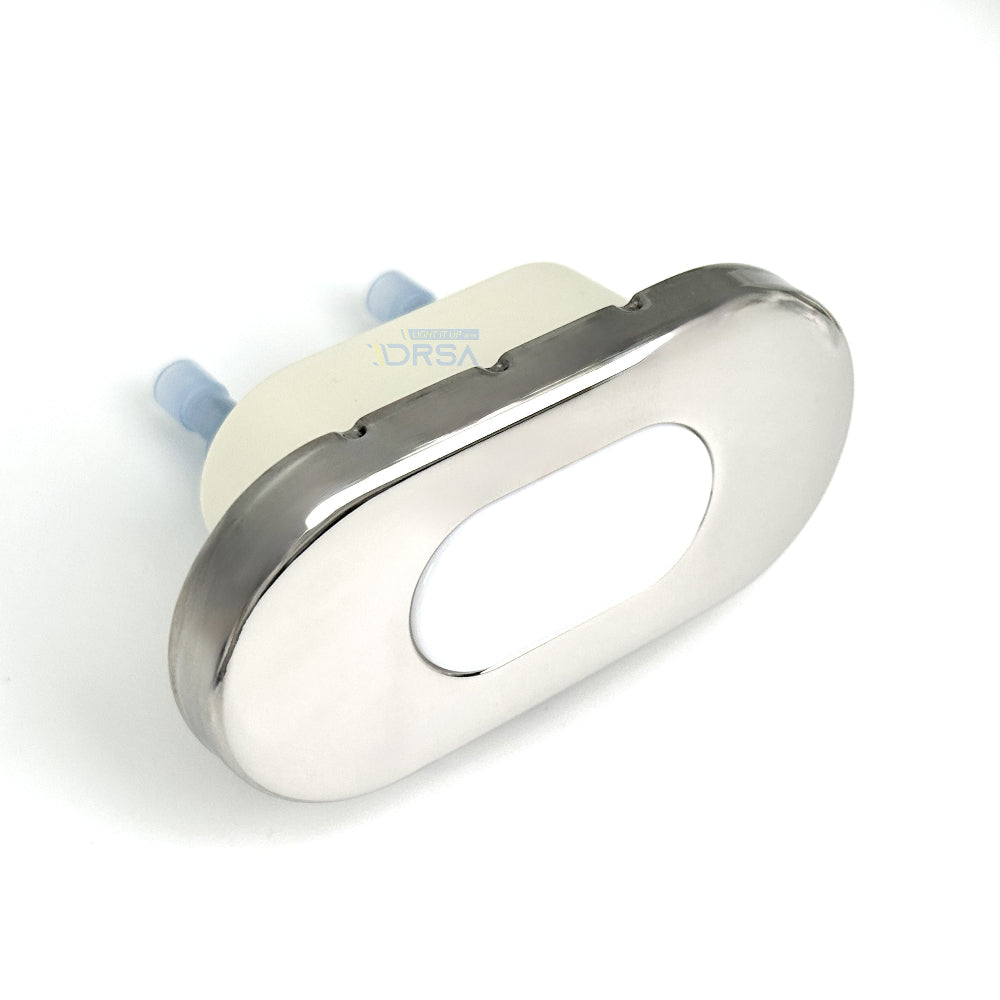 side view of the stainless steel oval courtesy light highlighting its slim profile 