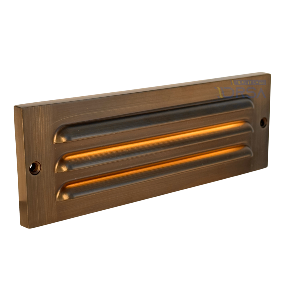 Antique brass LED step light with louvered faceplate

