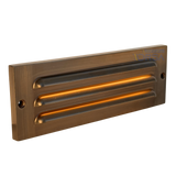Antique brass LED step light with louvered faceplate

