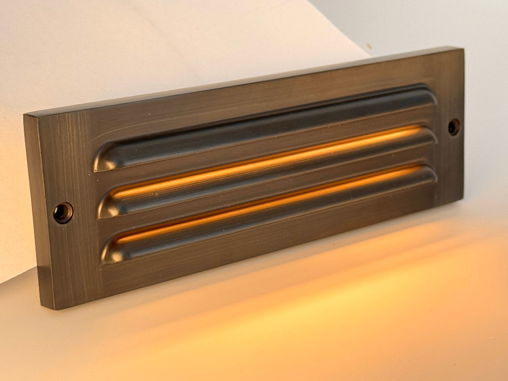 Antique brass LED step light with louvered faceplate warm white 

