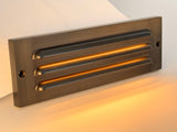 Antique brass LED step light with louvered faceplate warm white 

