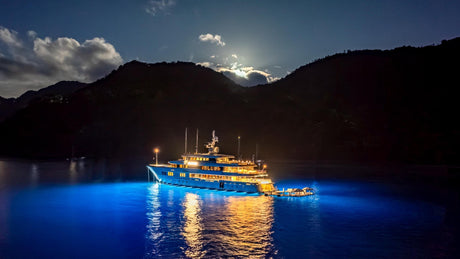 Lumishore THX804 underwater light with blue and white LEDs on yacht

