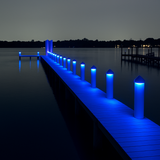 White piling cap dock light with color-changing RGBW LED with blue lit

