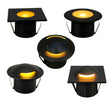 Set of five black outdoor mini dock lights with glowing yellow centers on a white background