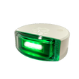 Green LED light with white base on a white background 101838