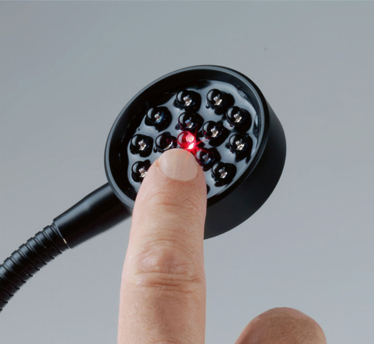 Marine touch-sensitive reading light with cool white and red LED output

