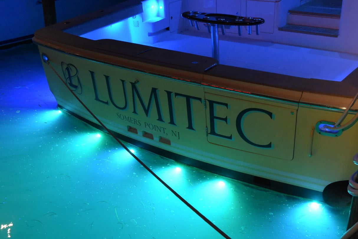 SeaBlaze X3 Spectrum underwater light, 7,000+ lumens, polished installed at night on sportfish yacht