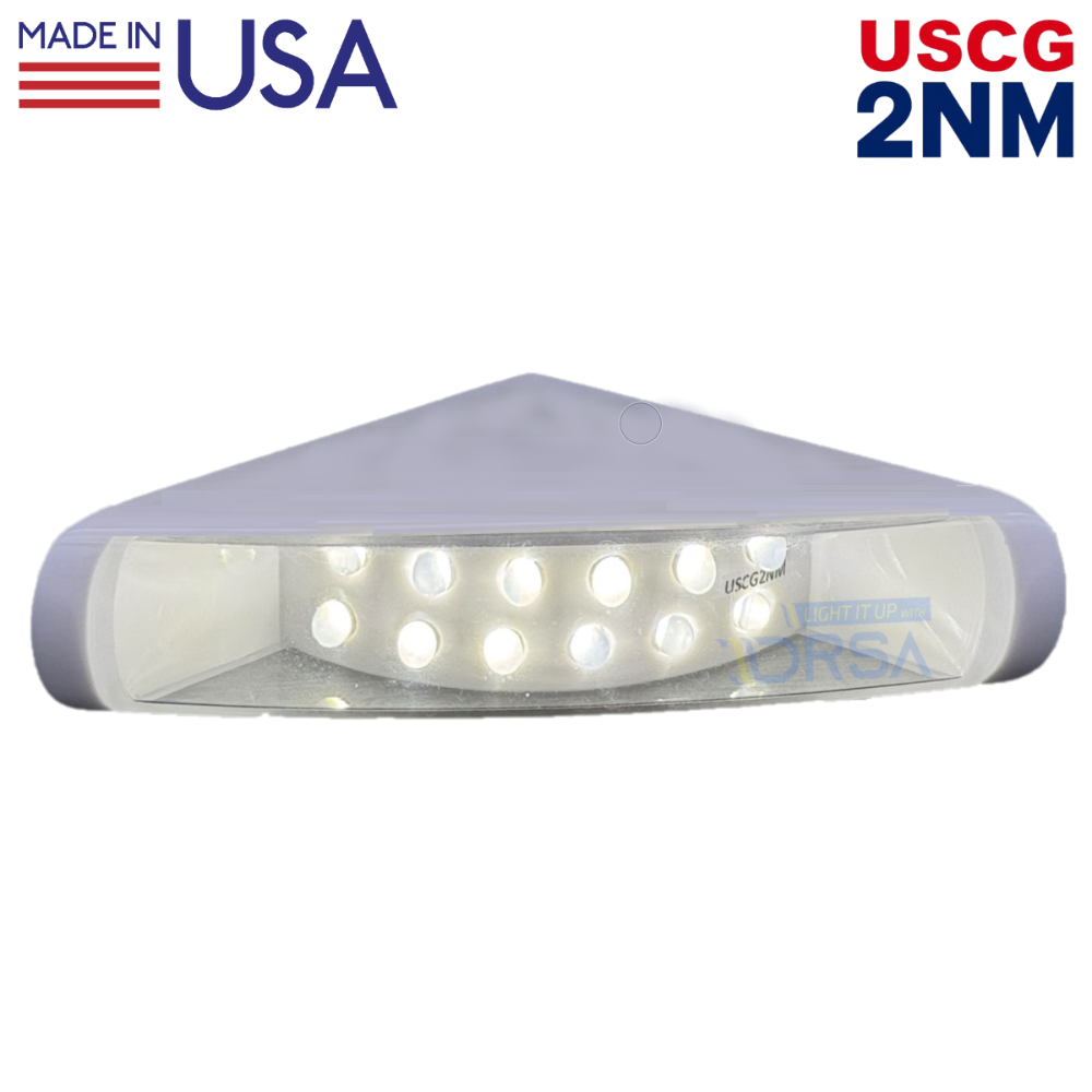 LED light fixture with 'Made in USA' and 'USCG 2NM' text on a white seahunter center console sten nav light no background
