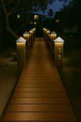 White piling dock light with warm white LED on walkway at night