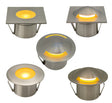 Set of five stainless steel outdoor mini dock lights with glowing yellow interior on a white background
