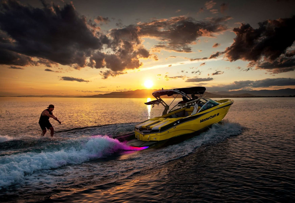 Javelin 600X underwater light, sleek rectangular design, RGBW output installed on wakeboat at sunset