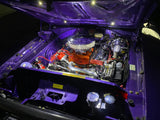 Led bullet light Car engine with a purple hood and visible components custom automotive builds