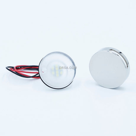 Marine courtesy light with one adjustable light beam

